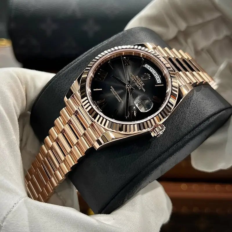 ROLEX ROSE GOLD BLACK DAIL